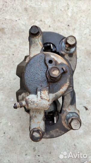 Суппорт тормозной передний toyota corolla 150