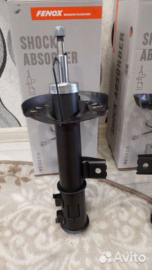 Передние стойки амортизатора