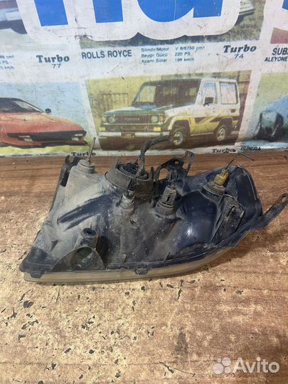 Фара правая оригинал Мазда Трибьют