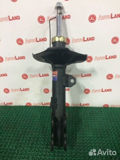 Стойка передняя левая Toyota Corolla NZE121 1NZ-FE