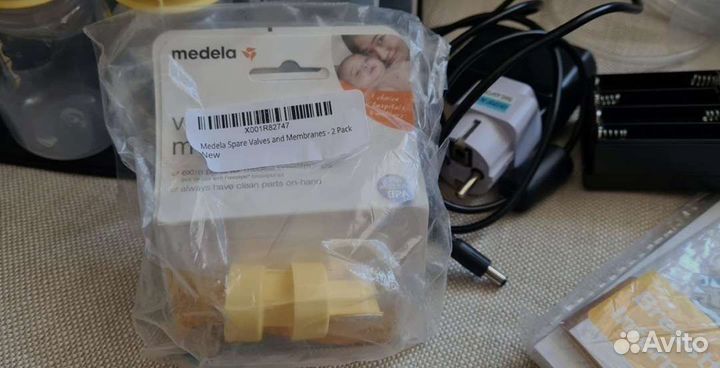 Молокоотсос medela электрический