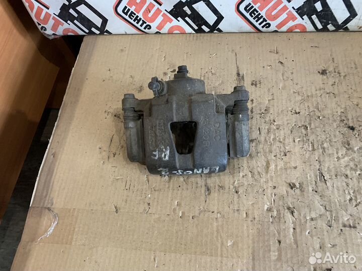 Суппорт передний левый правый Chevrolet Lanos