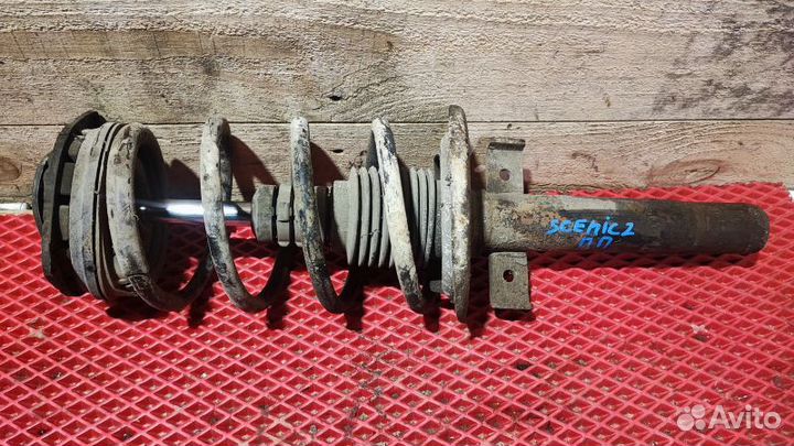 Стойка амортизатора переднего правого Renault Scen