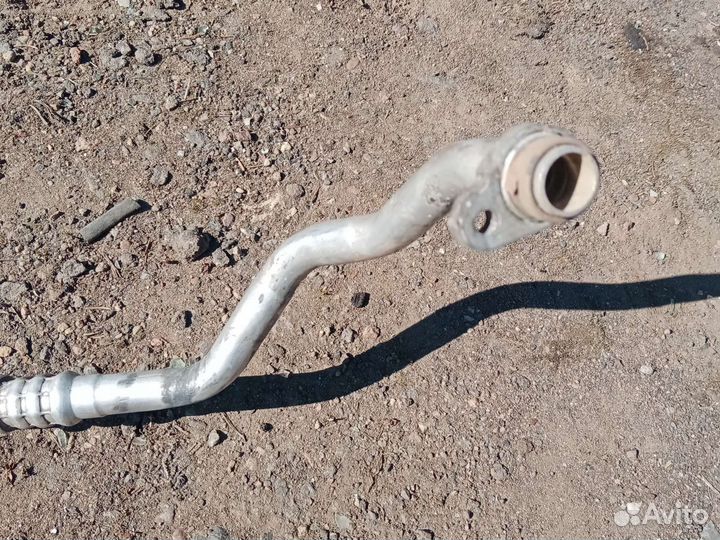 Трубка кондиционера Рено логан 1 2014г.в 1.4 8кл