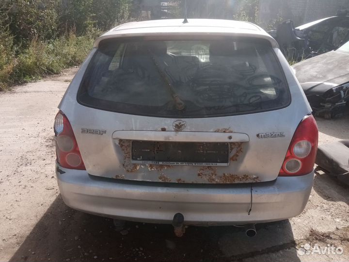 Бампер передний Mazda 323 BJ