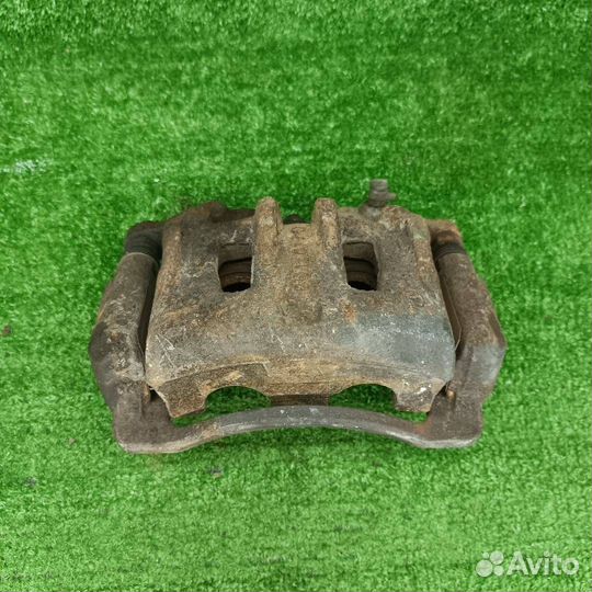 Суппорт тормозной передний левый SsangYong Actyon