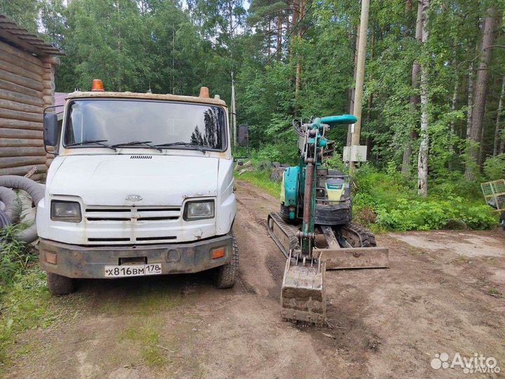 Миниэкскаватор и эвакуатор