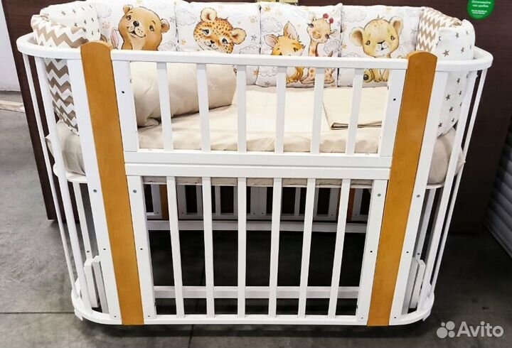 Детская кроватка с маятником