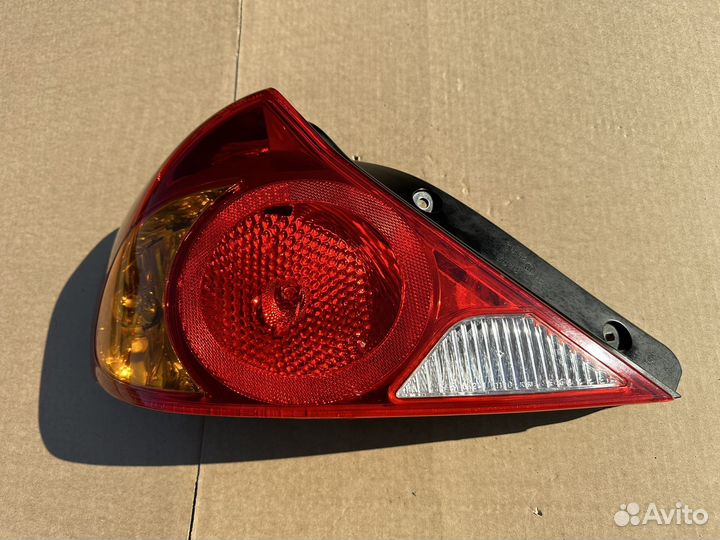 Фонарь задний левый Kia Spectra