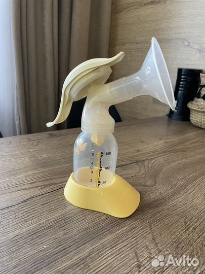 Молокоотсос medela ручной