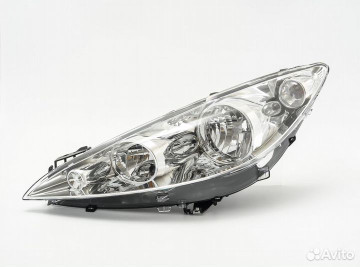 Фара левая Peugeot 408