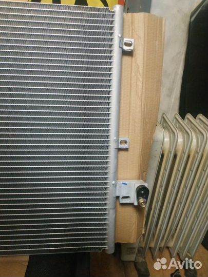 Радиатор кондиционера Ssang Yong Kyron