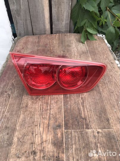 Фонарь задний левый внутренний Mitsubishi Lancer X
