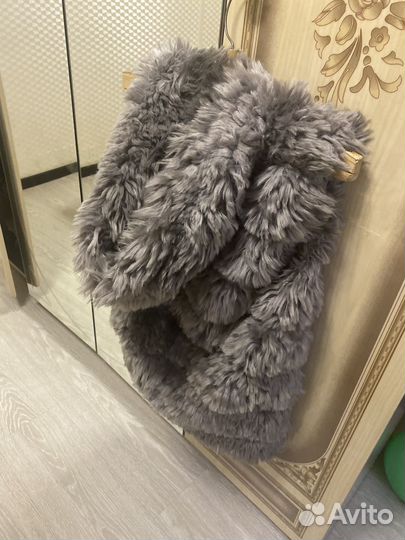 Меховая жилетка