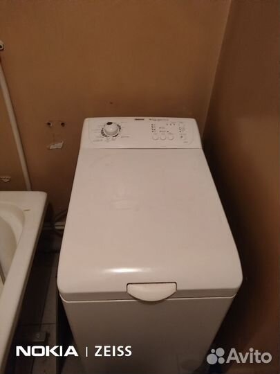 Стиральная машина с вертикальной загрузкой