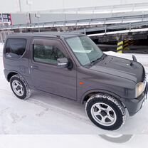 Suzuki Jimny 0.7 AT, 2011, 141 000 км, с пробегом, цена 1 100 000 руб.