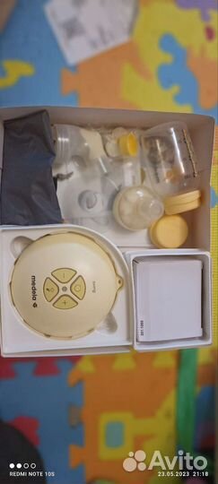 Молокоотсос medela swing электрический