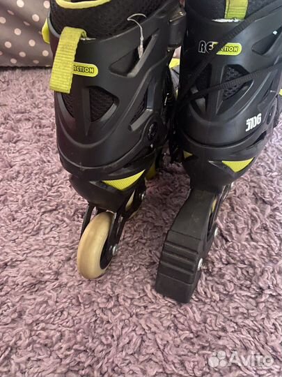 Роликовые коньки