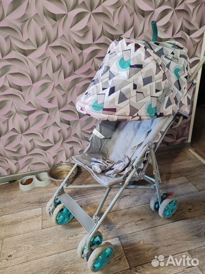 Прогулочная коляска трость
