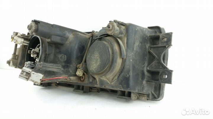 Фара левая Mitsubishi Sigma F16A 6G72 1991