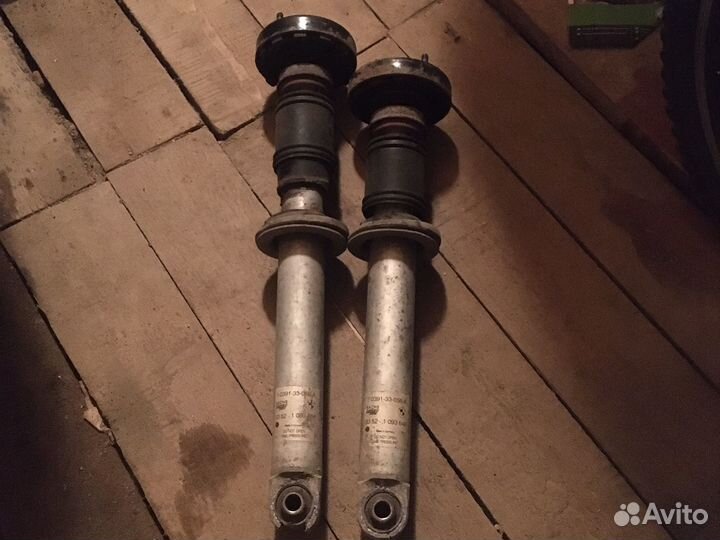 Стойка амортизатора задняя bmw e39