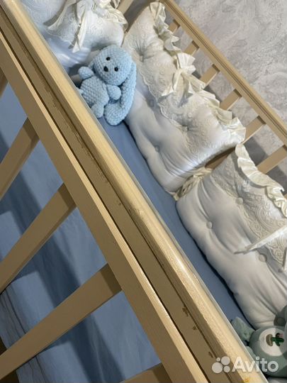 Детская кроватка с поперечным маятником