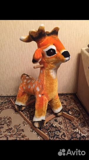 Детская игрушка качалка