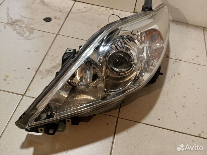 Фара левая Mazda Premacy crew