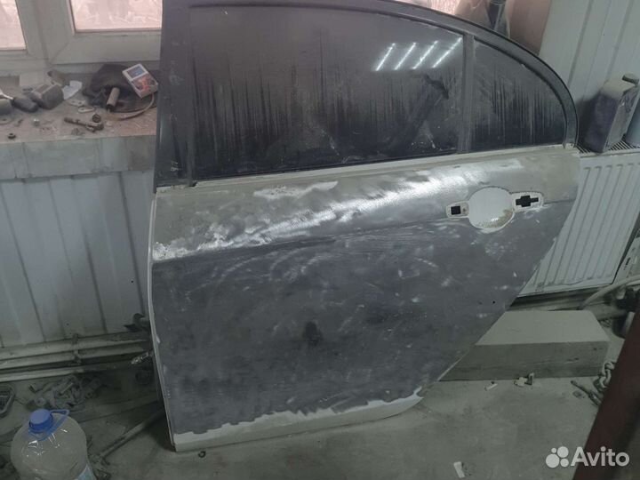 Дверь задняя левая Geely Emgrand EC7