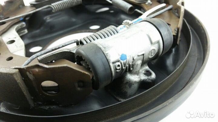 Механизм тормозной задний левый Toyota Vitz KSP130