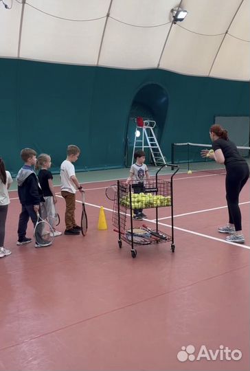 Тренер по большому теннису