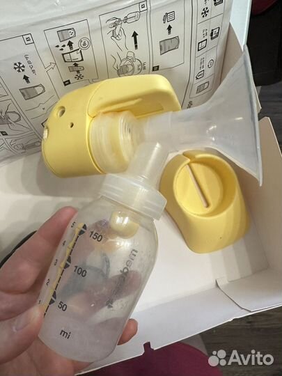 Молокоотсос medela электрический