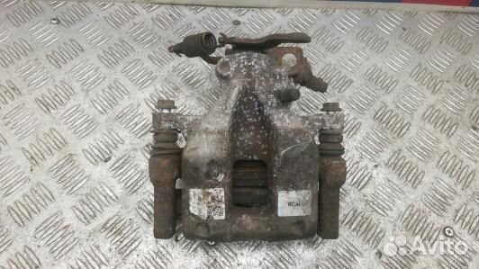 Суппорт тормозной задний правый toyota avensis T27