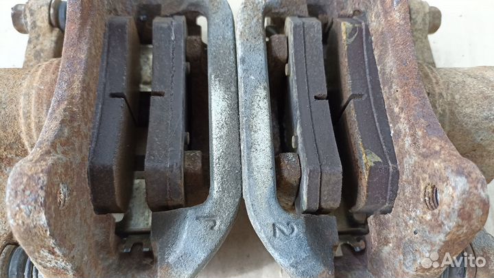 Суппорт тормозной правый левый Шевроле Лачетти