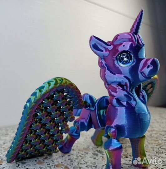 Единорог подвижная игрушка