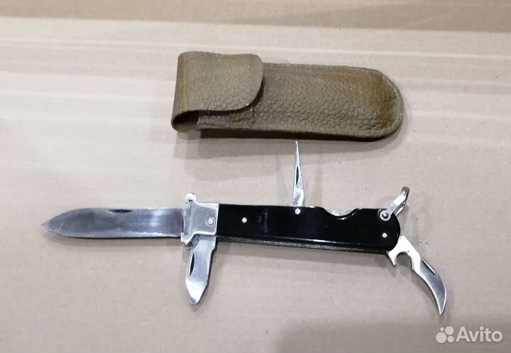 Нож охотника складной с экстракторами для гильз