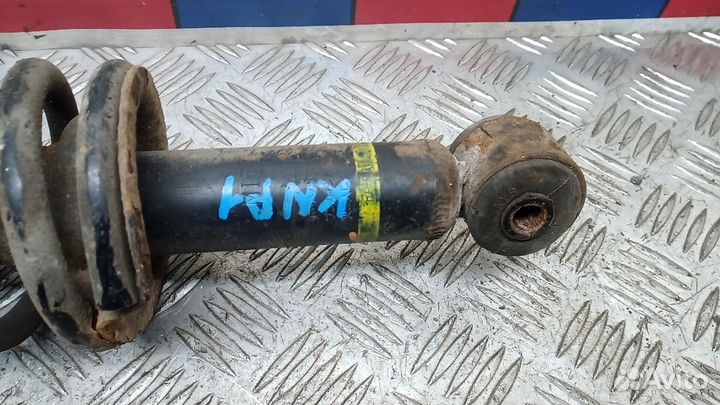 Стойка амортизатора заднего левого Mitsubishi Outlander