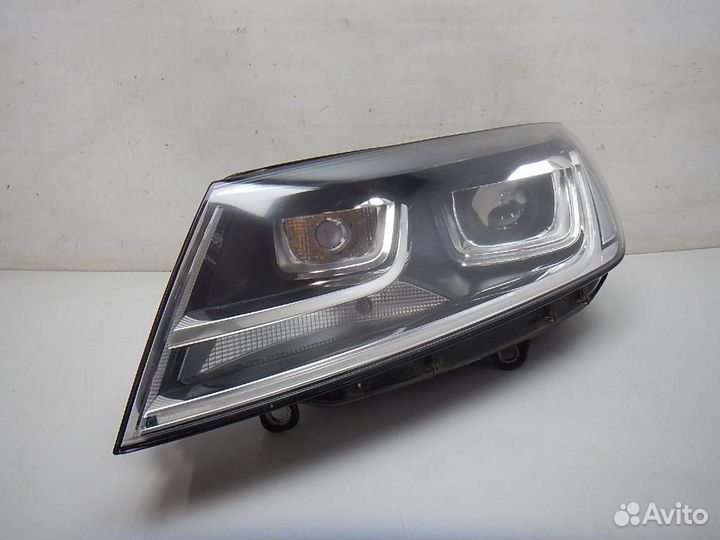 Фара левая Volkswagen Touareg