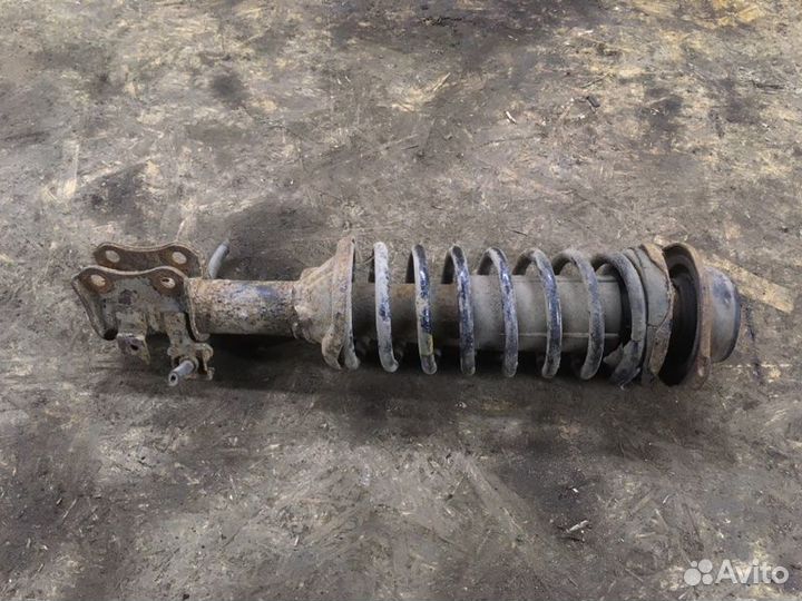 Стойка подвески передняя левая Kia Avella седан