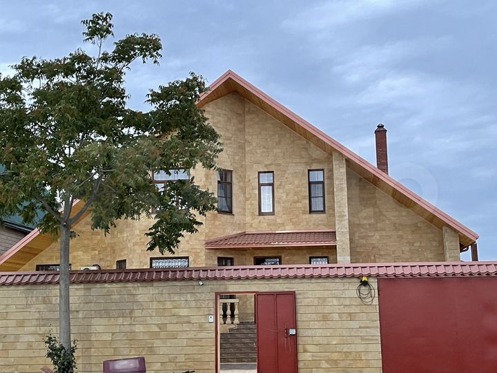 Дом 600 м² на участке 12 сот.