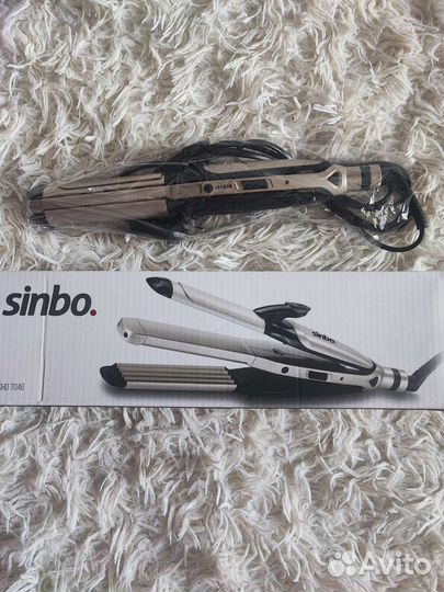 Выпрямитель волос, плойка и щепцы