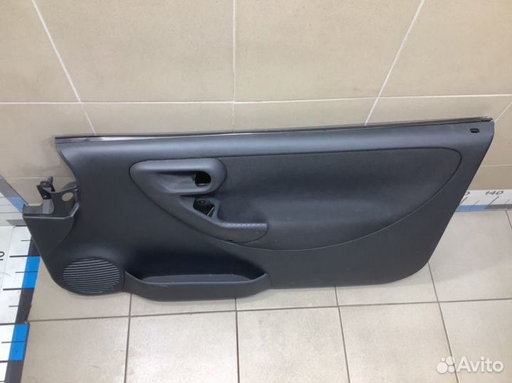 Обшивка двери передняя правая Opel Corsa C