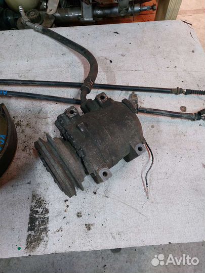 Компрессор кондиционера Kia Sportage 1