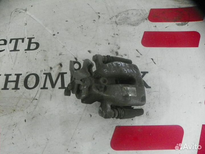 Суппорт тормозной задний левый Peugeot 3008