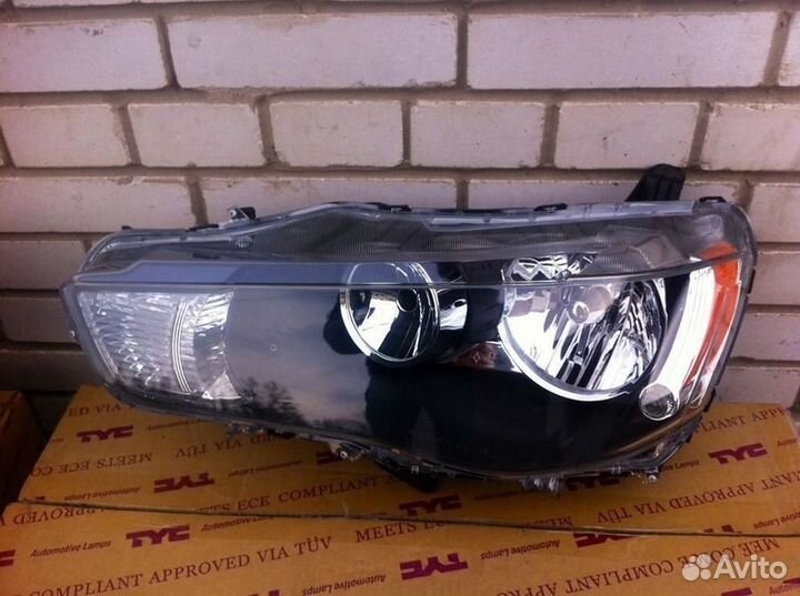 Фара левая Митсубиси Аутлендер 2 хл XL 2010