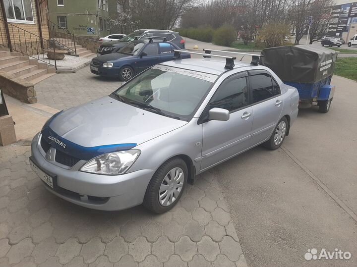 Багажник на крышу Mitsubishi Lancer 9, штатный