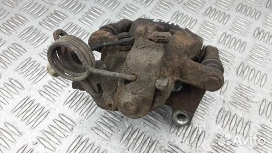 Суппорт тормозной задний правый ford kuga 1 (BUK09