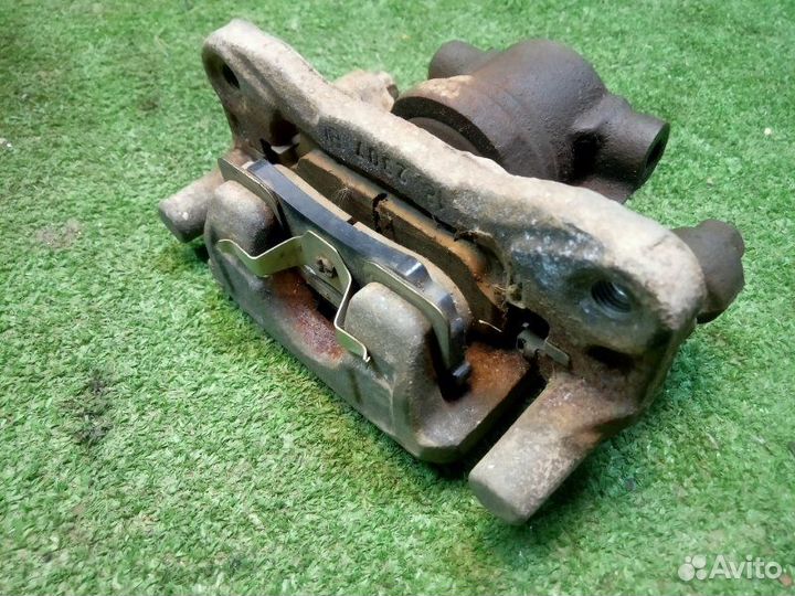 Суппорт задний левый Mitsubishi Lancer 10 4B11