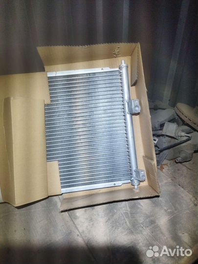 Радиатор кондиционера Nissan 92100-BM407