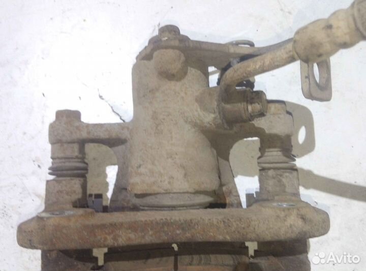 Суппорт тормозной задний левый KIA RIO QB Solaris